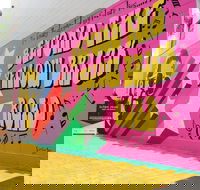 Yellow Brick Road and Elton John Mural - Attractions