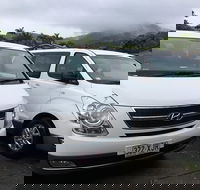 IMAX Private Transfer 7 Guests Cairns Airport to Hotels in Cairns City - Attractions